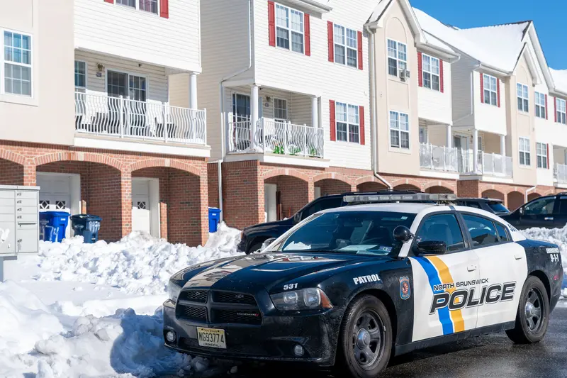 A police car in front of townhouses in North Brunswick, New Jersey.