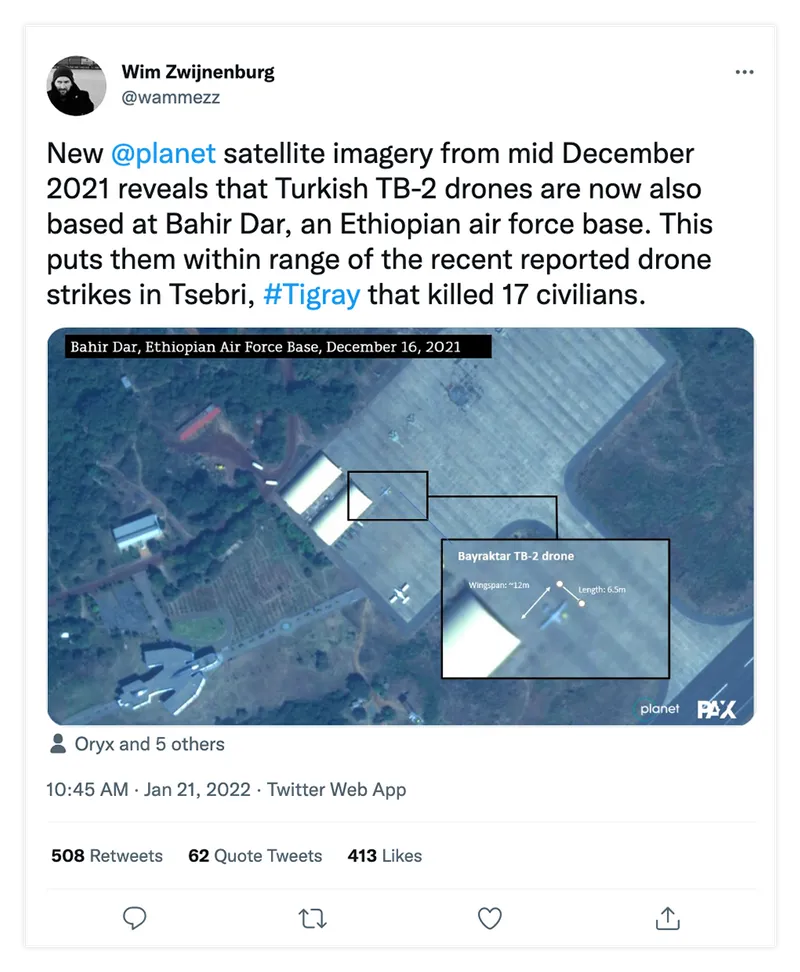 A screenshot of a tweet that annotates a satellite image of hangars and tarmac, marking a craft as a TB2 drone.