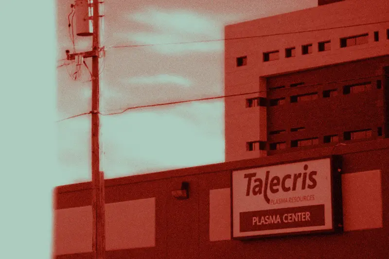 A building with a sign that says "Talecris plasma center."