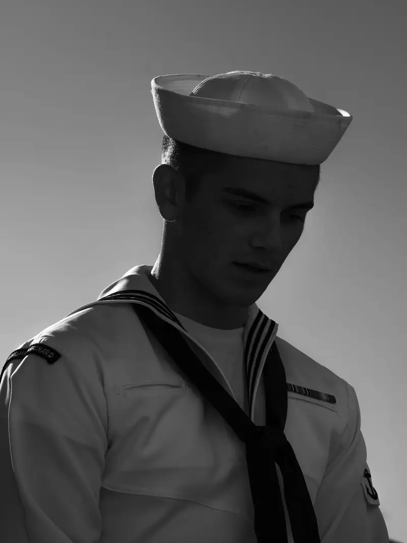 A young man in a sailor suit